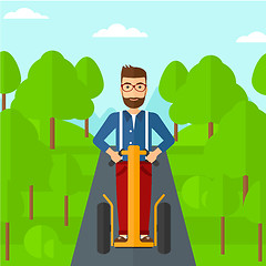 Image showing Man riding on electric scooter.