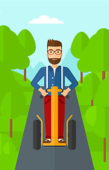 Image showing Man riding on electric scooter.