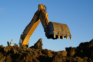 Image showing Shovel bucket against blue sky