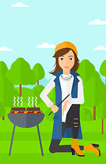 Image showing Woman preparing barbecue.