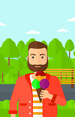 Image showing Man holding icecream.