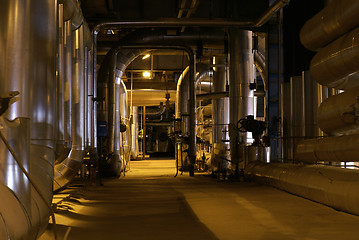 Image showing Equipment, cables and piping as found inside of a modern industr