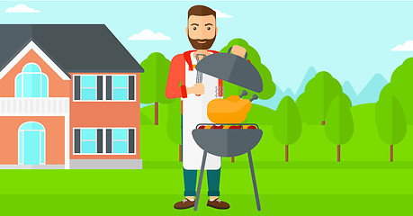 Image showing Man preparing barbecue.