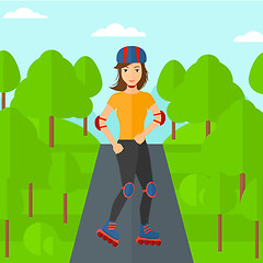 Image showing Sporty woman on roller-skates.