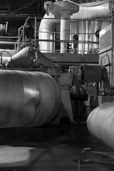 Image showing Equipment, cables and piping as found inside of a modern industr