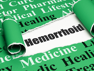 Image showing Health concept: black text Hemorrhoid under the piece of  torn paper