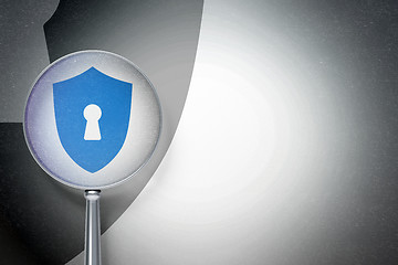 Image showing Privacy concept:  Shield With Keyhole with optical glass on digital background