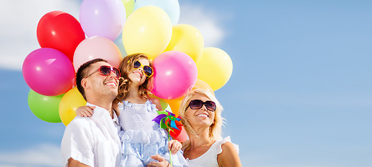 Image showing family with colorful balloons