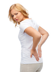 Image showing unhappy woman suffering from backache