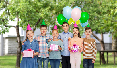 Image showing happy children with gifts on birthday party
