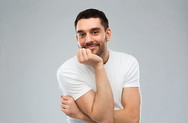 Image showing smiling man over gray background