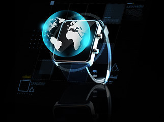 Image showing close up of smart watch with earth globe