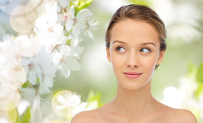 Image showing smiling young woman face and shoulders