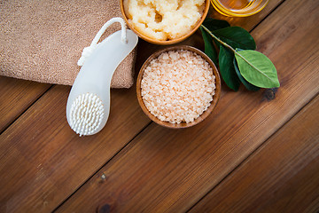 Image showing close up of himalayan salt with brush and towel
