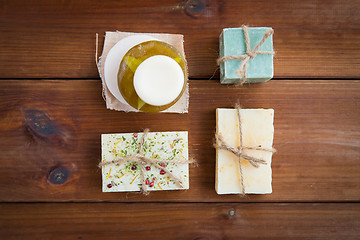 Image showing close up of handmade soap bars on wood