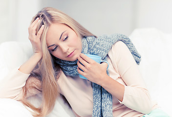 Image showing diseased woman with cup of tea