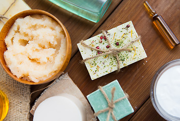 Image showing close up of body care cosmetic products on wood