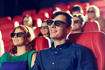 Image showing happy friends watching movie in 3d theater