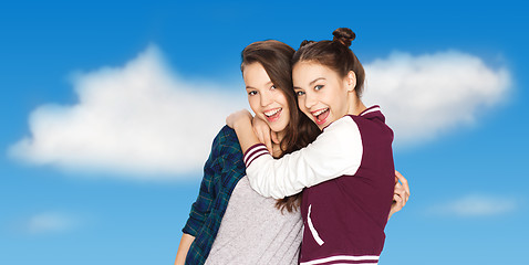 Image showing happy smiling pretty teenage girls hugging