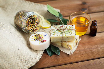 Image showing close up of handmade soap bars on wood