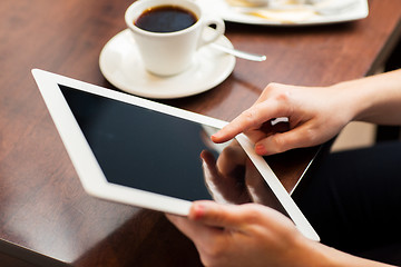 Image showing close up of woman with tablet pc and coffee