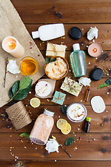 Image showing close up of body care cosmetic products on wood