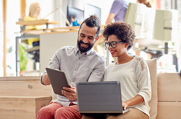 Image showing creative team with laptop and tablet pc in office