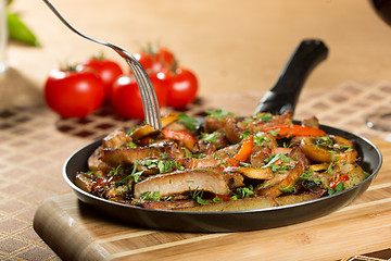 Image showing roast meat in a frying pan.