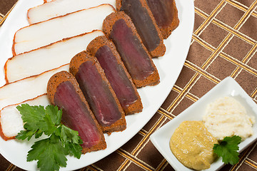 Image showing Cutted meat and lard on a plate