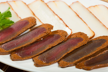 Image showing Cutted meat and lard on a plate