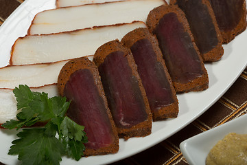 Image showing Cutted meat and lard on a plate