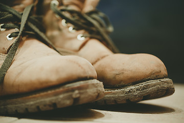 Image showing Old and Dirty boots in mud