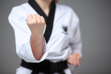 Image showing The karate girl with black belt 