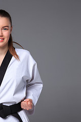 Image showing The karate girl with black belt 