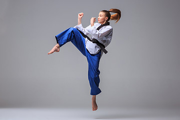 Image showing The karate girl with black belt 