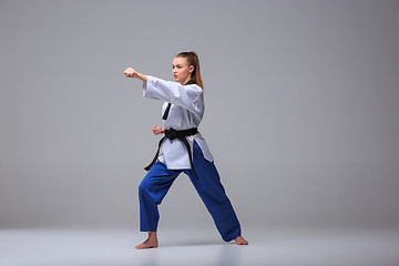 Image showing The karate girl with black belt 