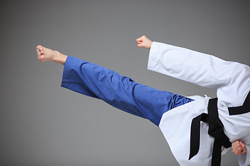 Image showing The karate girl with black belt 