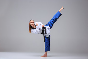 Image showing The karate girl with black belt 