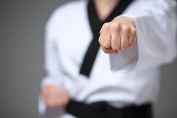 Image showing The karate girl with black belt 