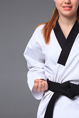 Image showing The karate girl with black belt 