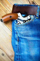 Image showing revolver in the pocket