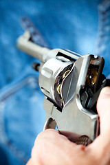 Image showing pistol in hand, close-up