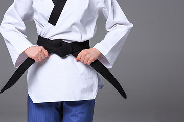 Image showing The karate girl with black belt 