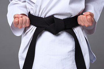 Image showing The karate girl with black belt 