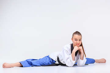 Image showing The karate girl with black belt 