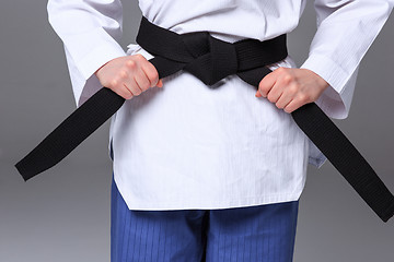 Image showing The karate girl with black belt 