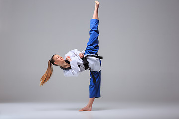 Image showing The karate girl with black belt 