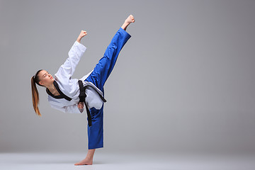 Image showing The karate girl with black belt 