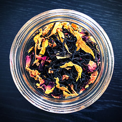 Image showing Aromatic black tea with flower petals