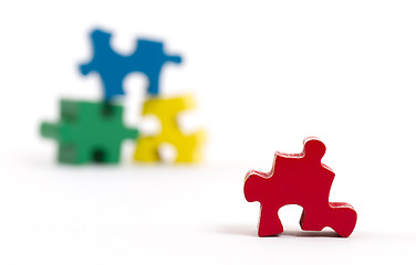 Image showing Closeup of big jigsaw puzzle piece, perspective